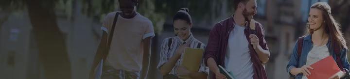 college students walking smiling